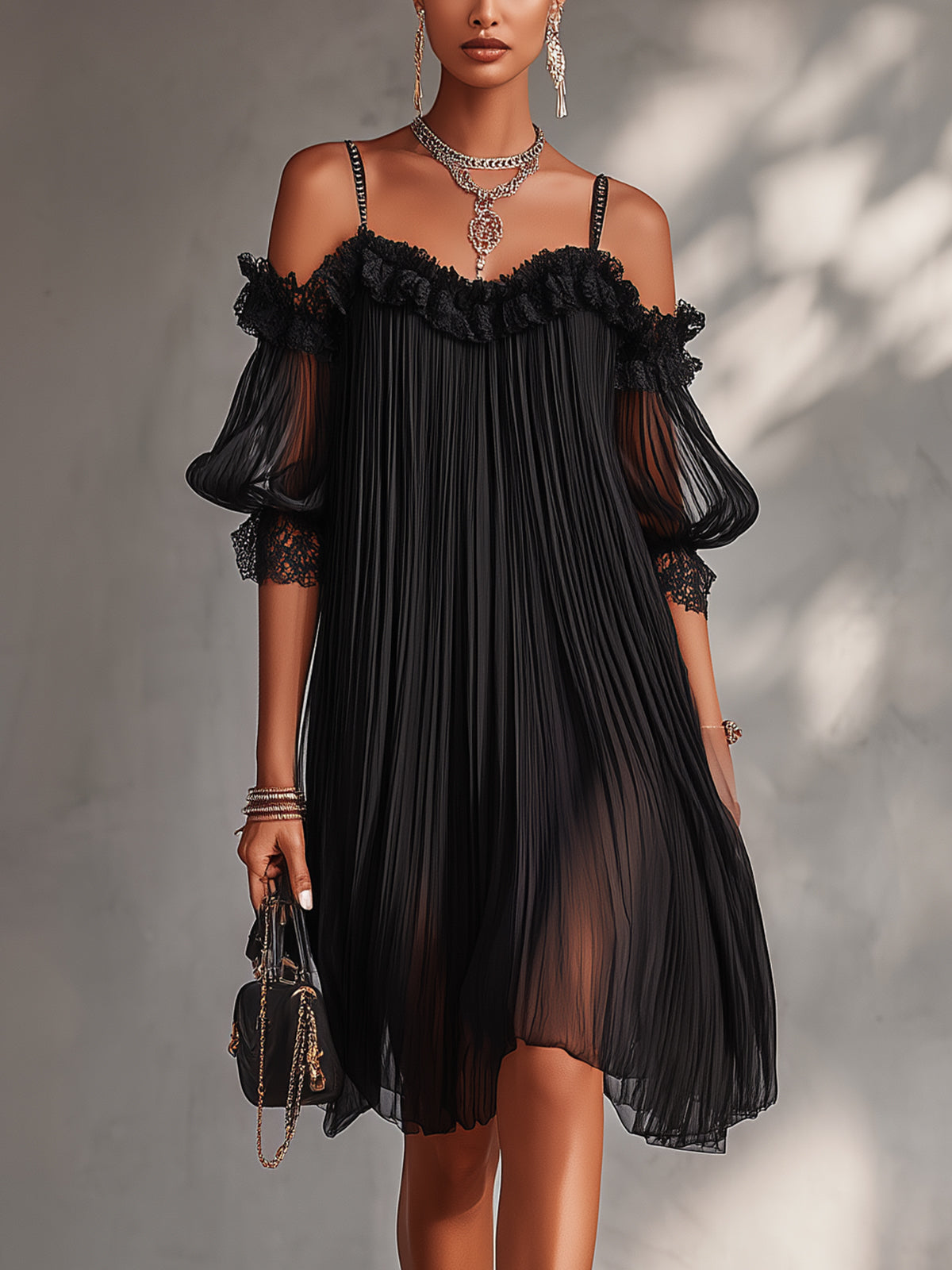mini vestido negro de muselina con hombros descubiertos. Ginebra