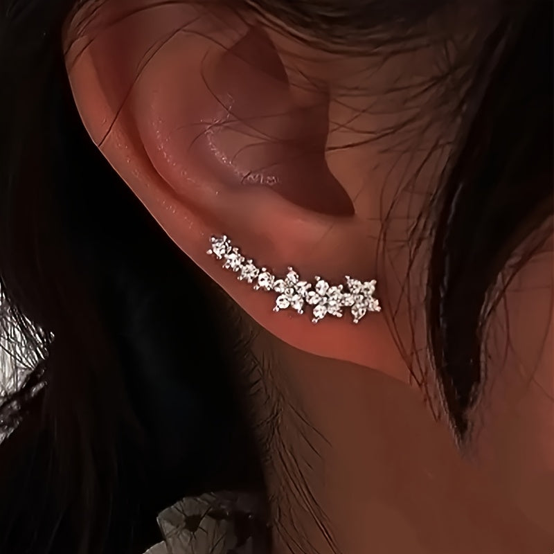 pendientes florales con acabado luminoso. Amarande