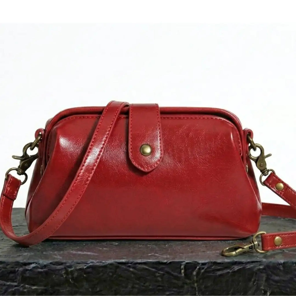 bolso vintage con asa de hombro. Aria