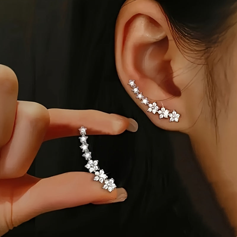 pendientes florales con acabado luminoso. Amarande