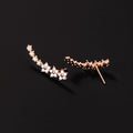 pendientes florales con acabado luminoso. Amarande