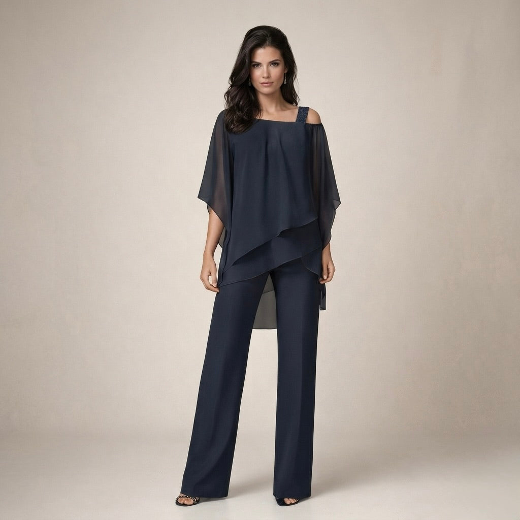 conjunto asimétrico fluido con hombro descubierto. Stella