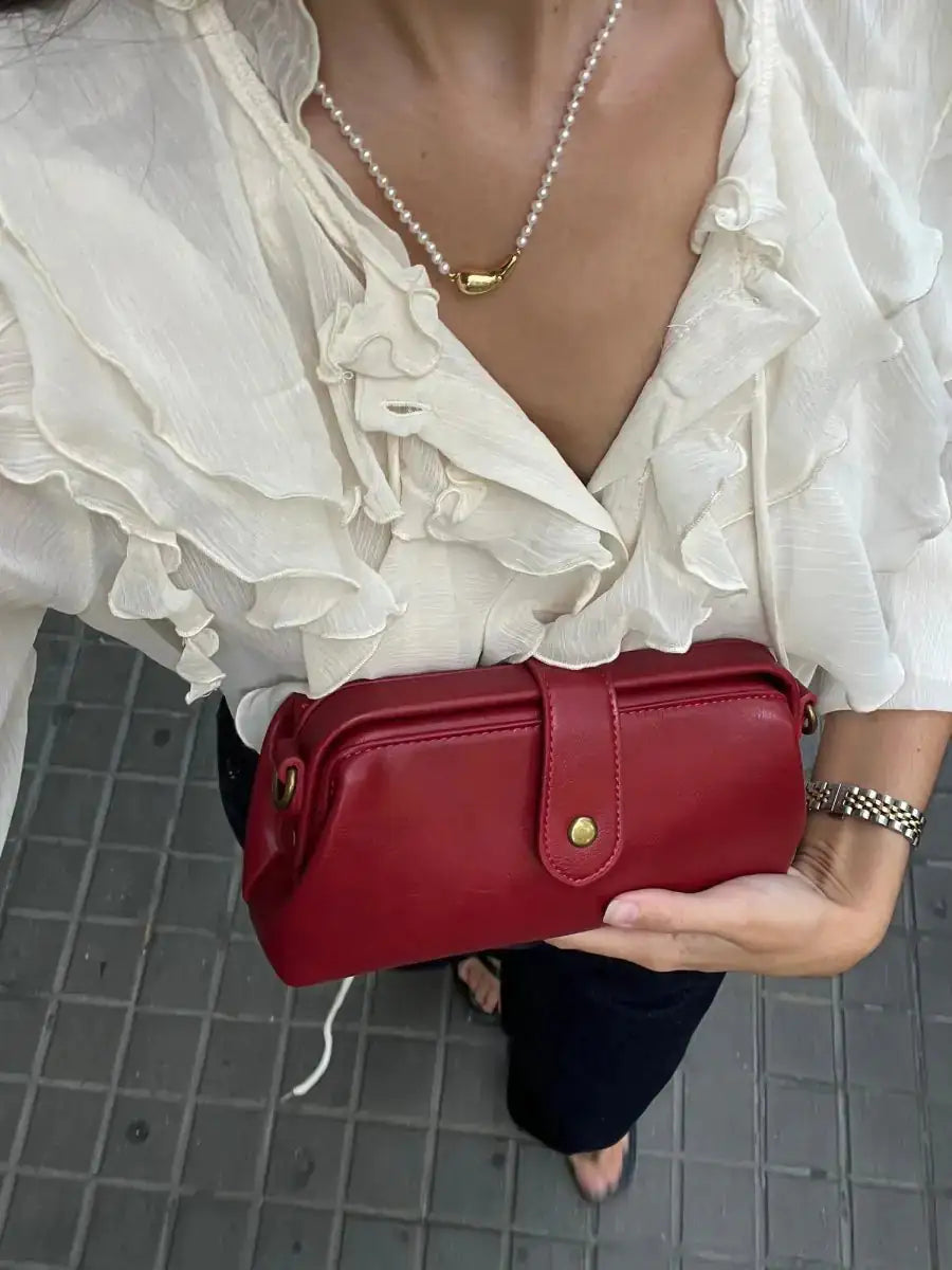 bolso vintage con asa de hombro. Aria