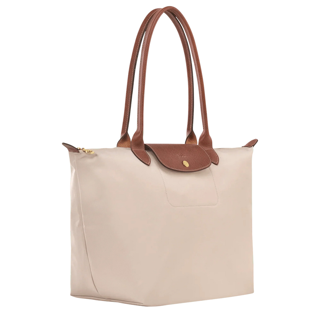 bolsa de tela técnica con detalles en cuero. Silvana