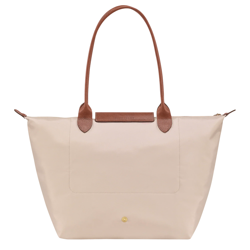 bolsa de tela técnica con detalles en cuero. Silvana