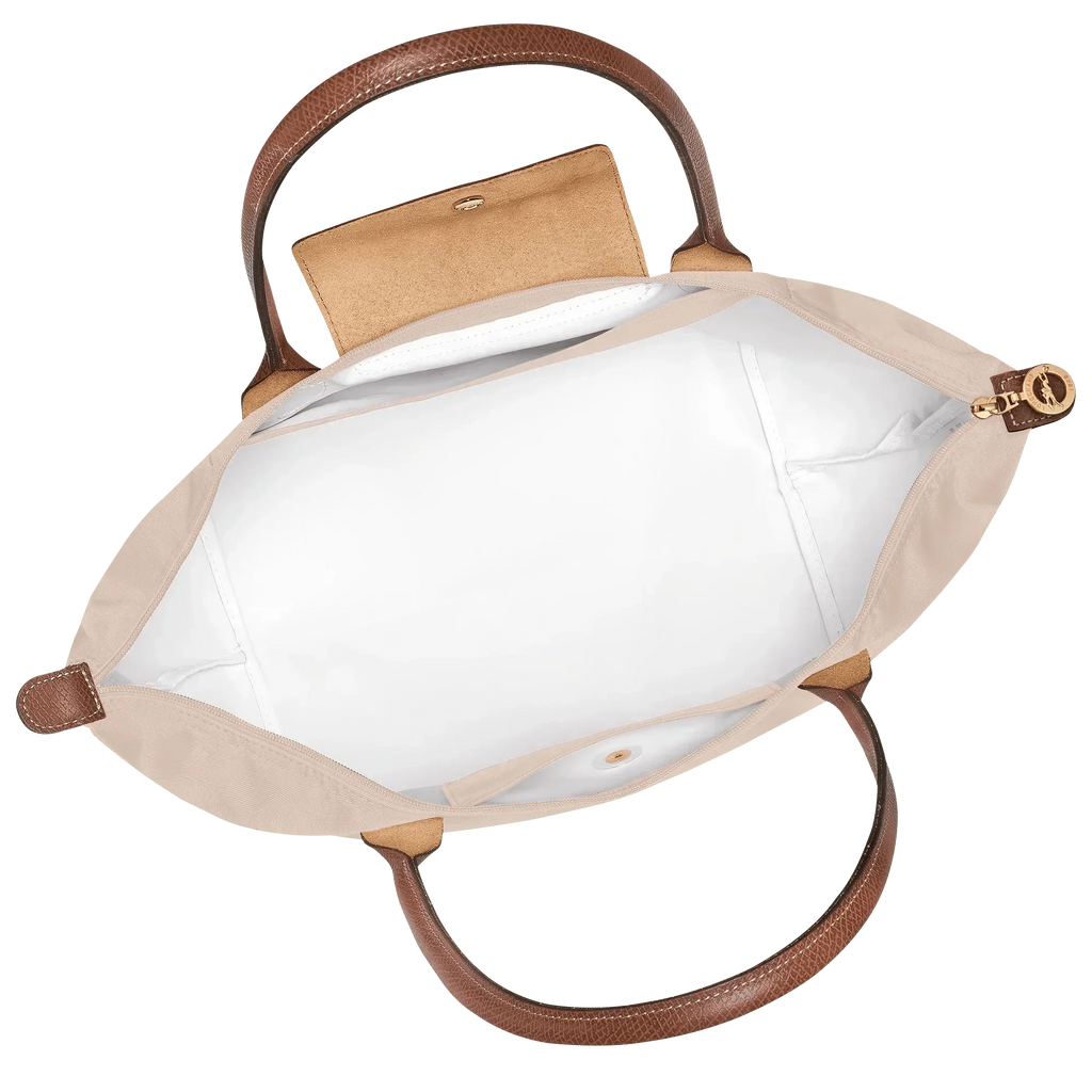 bolsa de tela técnica con detalles en cuero. Silvana