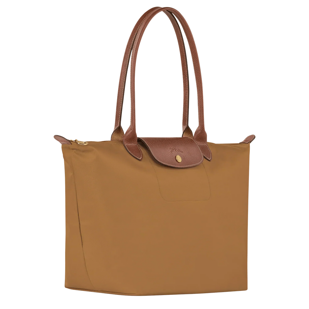 bolsa de tela técnica con detalles en cuero. Silvana