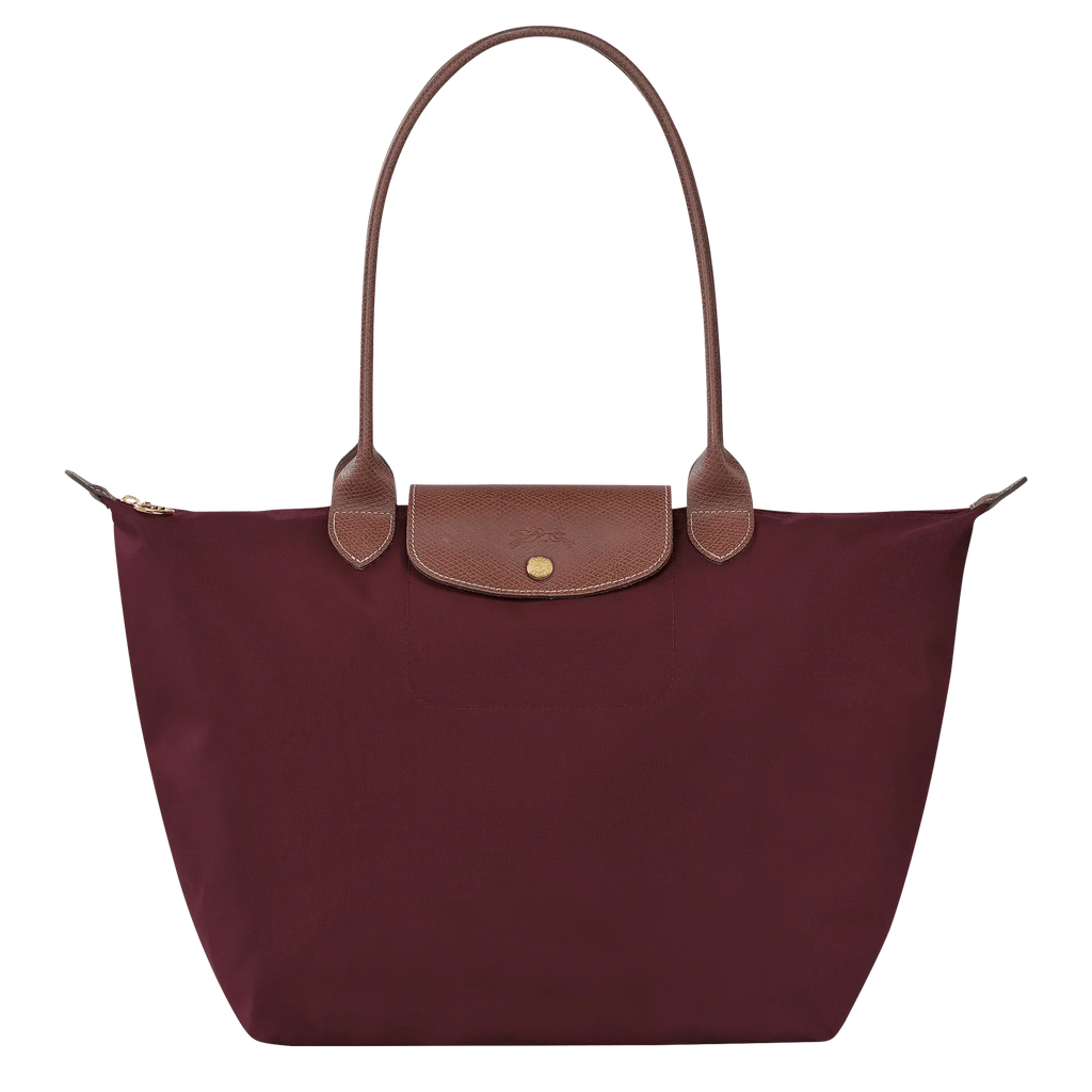 bolsa de tela técnica con detalles en cuero. Silvana