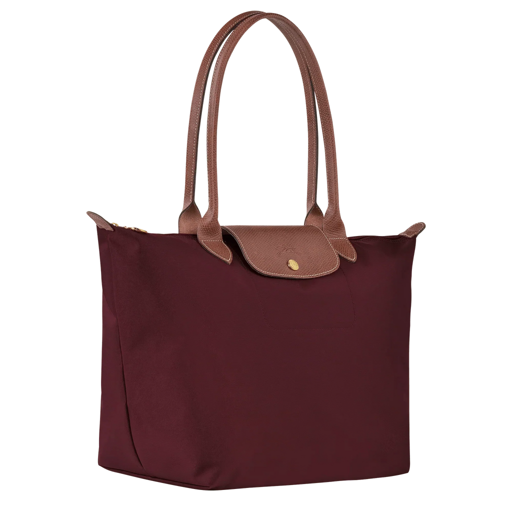 bolsa de tela técnica con detalles en cuero. Silvana
