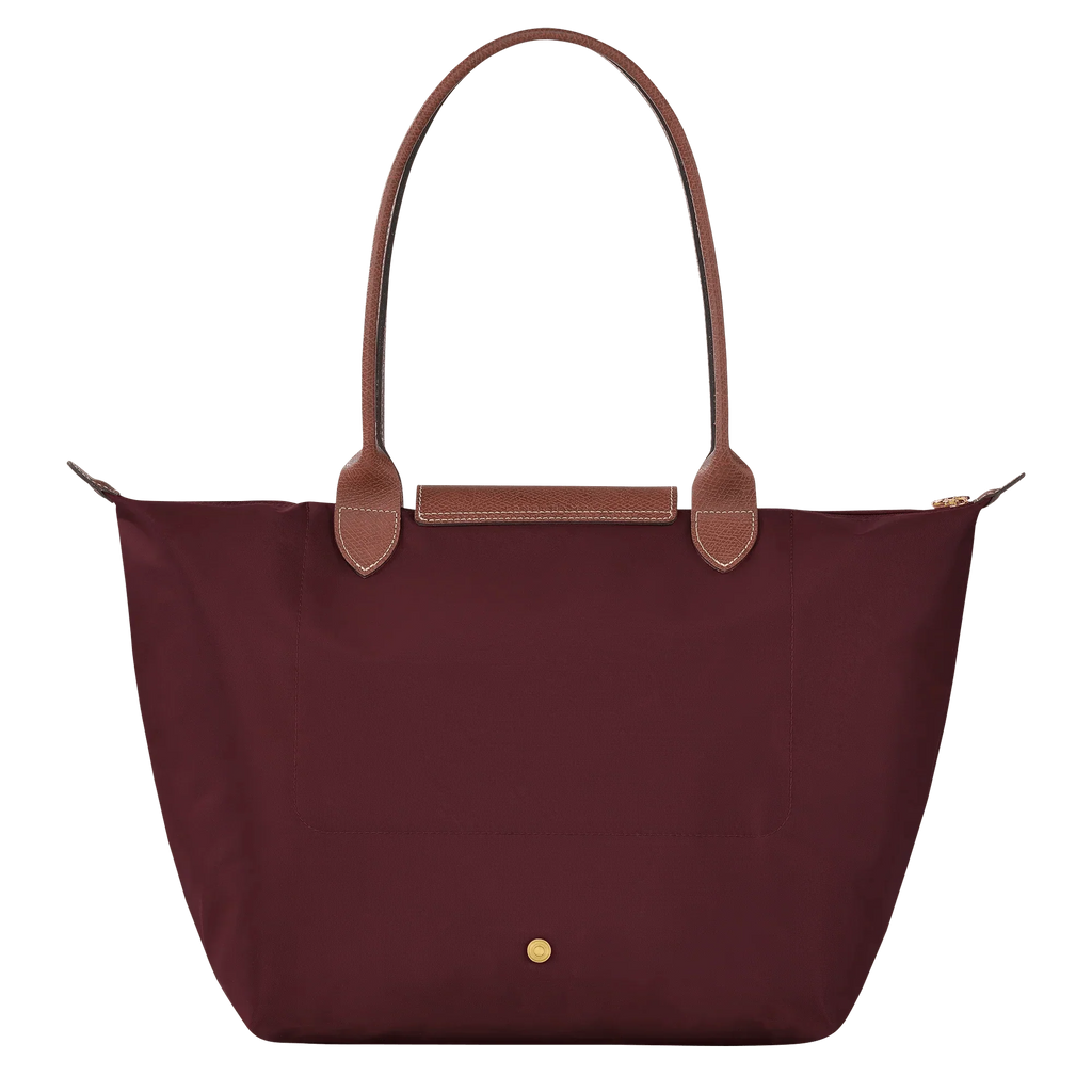 bolsa de tela técnica con detalles en cuero. Silvana