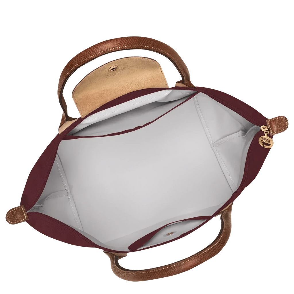 bolsa de tela técnica con detalles en cuero. Silvana