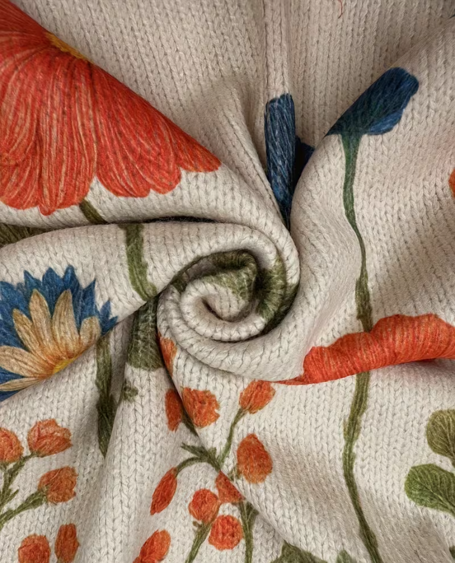 cardigan con cremallera y estampado floral. Prato