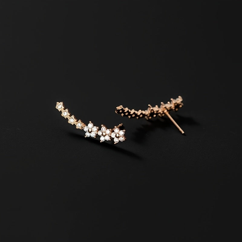 pendientes florales con acabado luminoso. Amarande