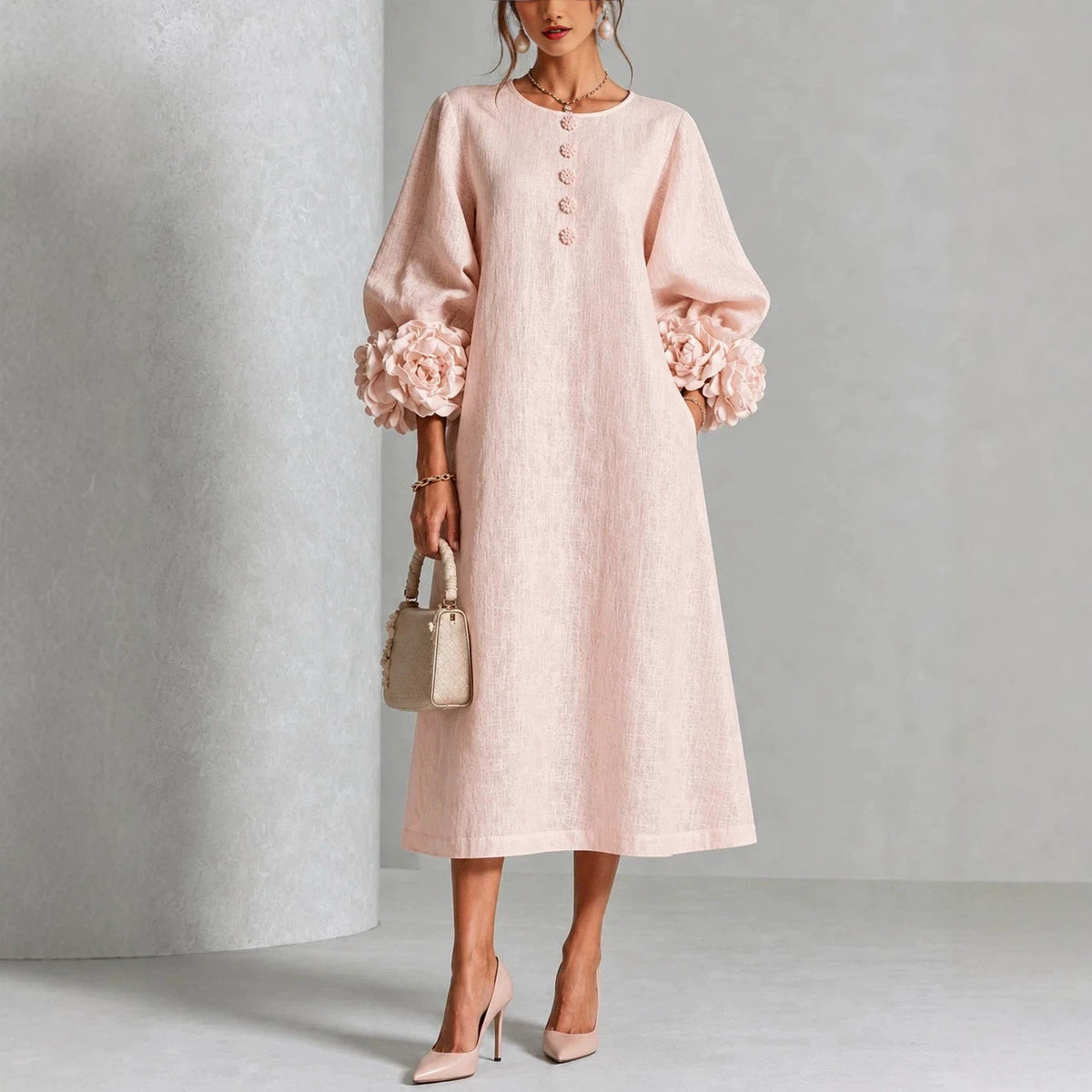 vestido midi floral con mangas de rosa. Vejer