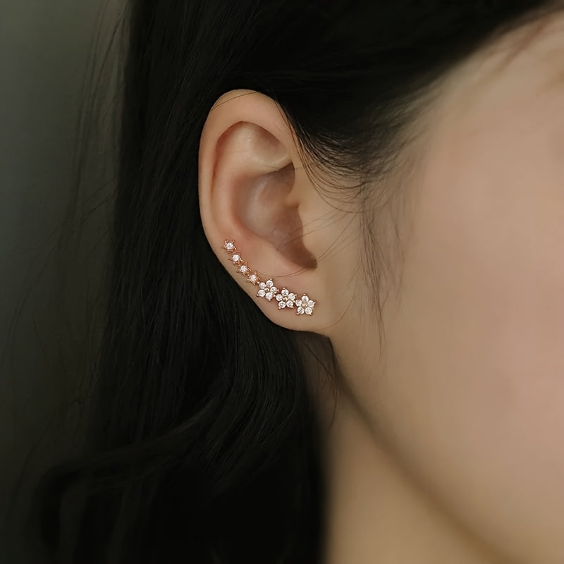 pendientes florales con acabado luminoso. Amarande