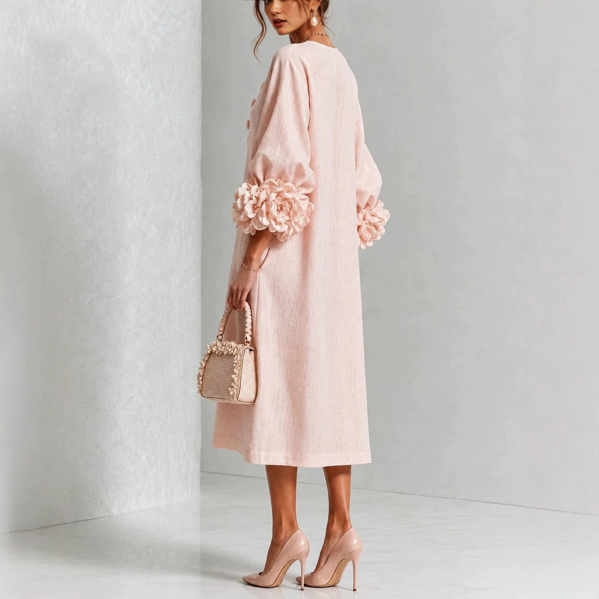 vestido midi floral con mangas de rosa. Vejer