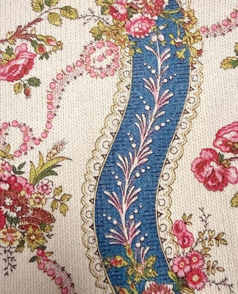 cardigan de punto con estampado floral y cintas. Eulalia