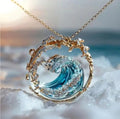 collana con onda azul y dorado. Ondara