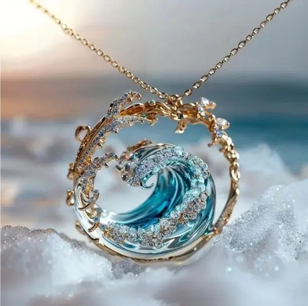 collana con onda azul y dorado. Ondara